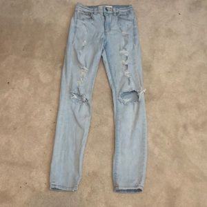 Garage acid wash destroyed jeans.